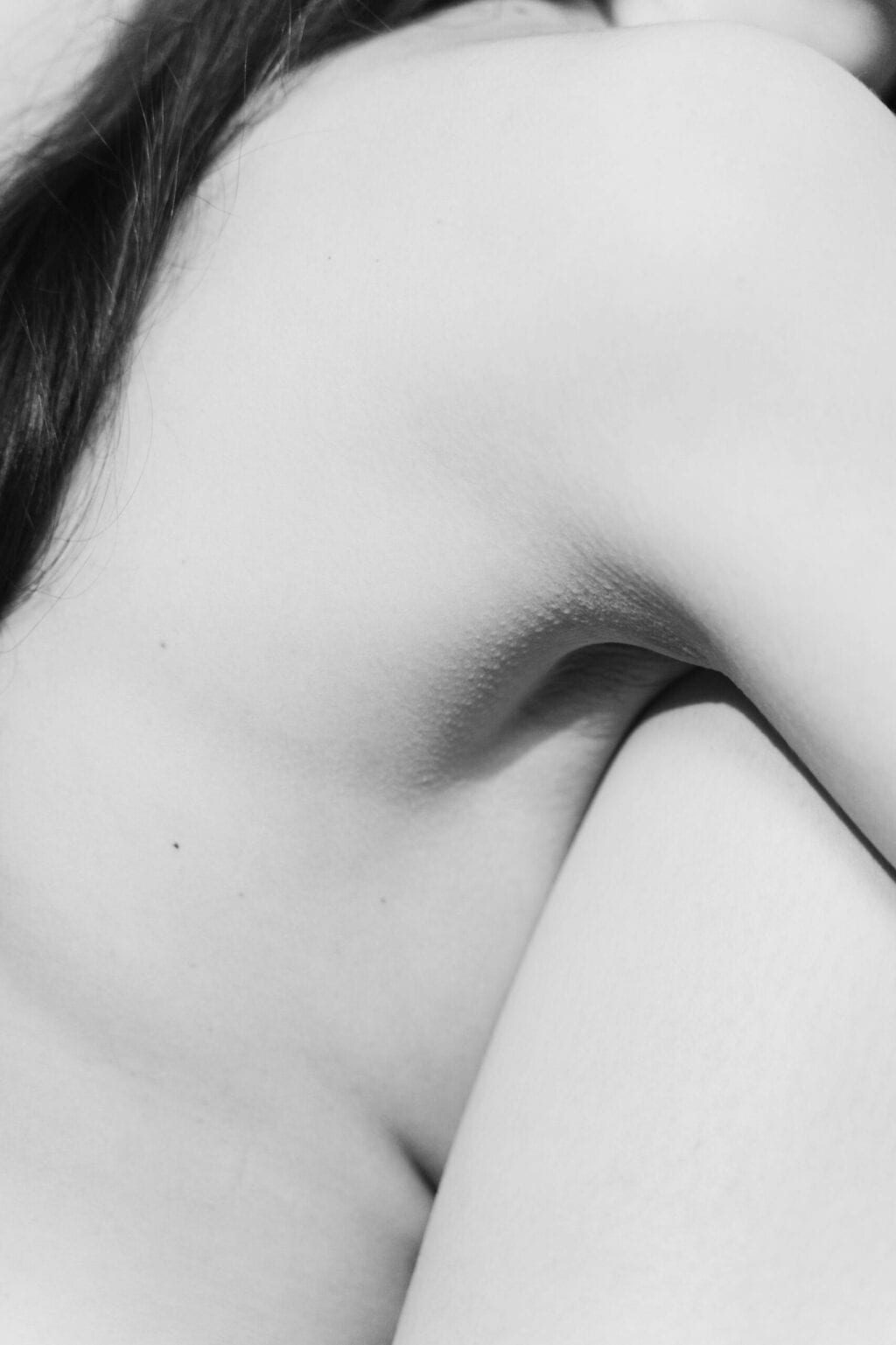 Black and white picture of a woman's armpit
