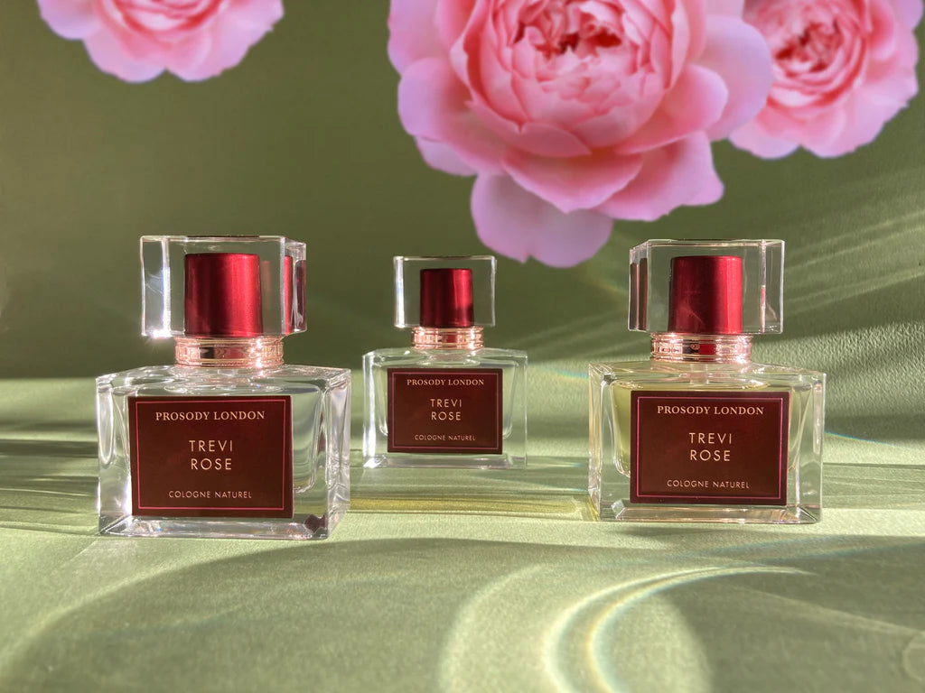 Three natural colognes with pink roses