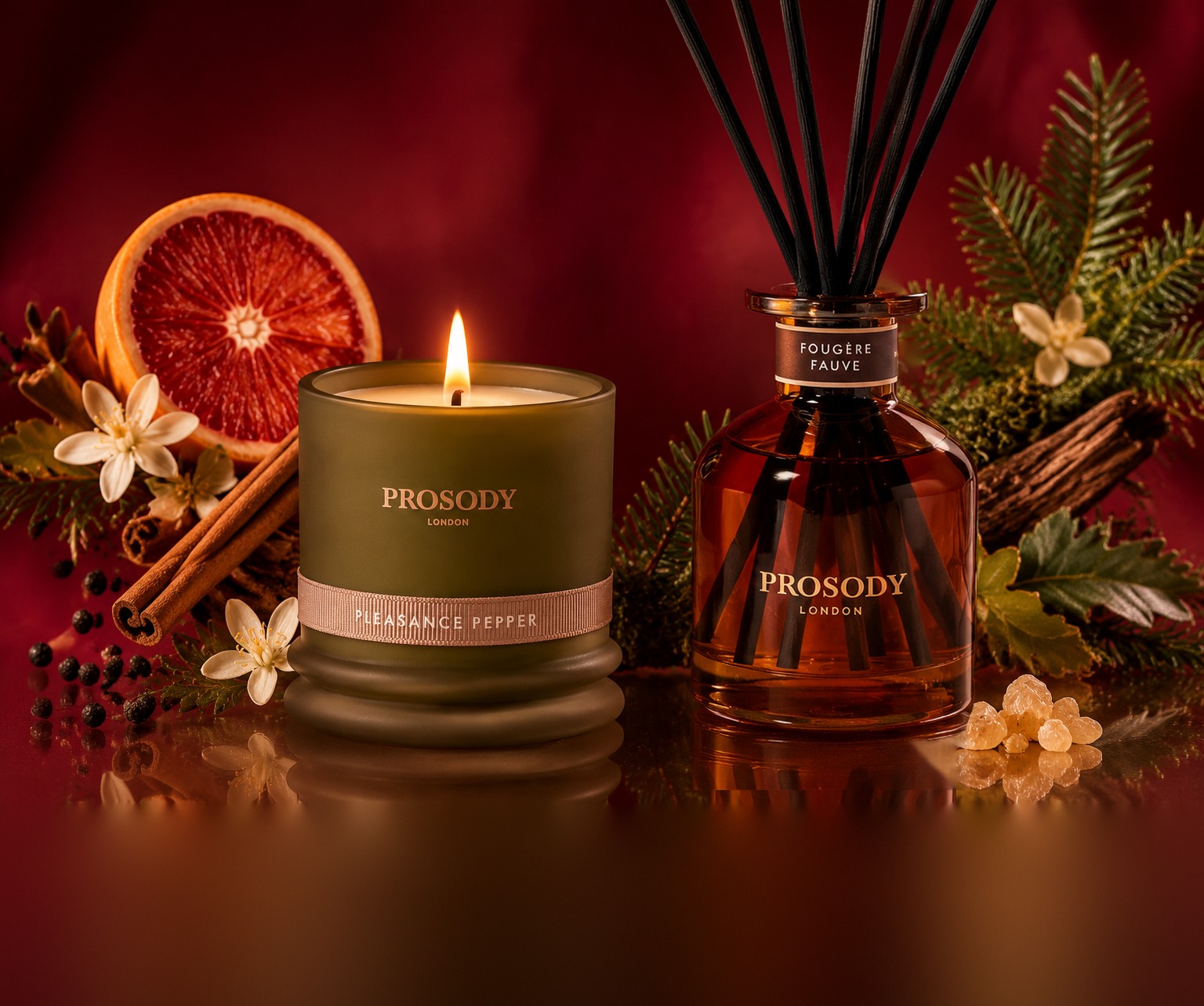 How to Make Your Home Smell Like Christmas Naturally: A Perfumer's Guide 1 Pleasance Pepper natural candle and Fougère Fauve reed diffuser with blood orange, cinnamon and pine — how to make your home smell like Christmas