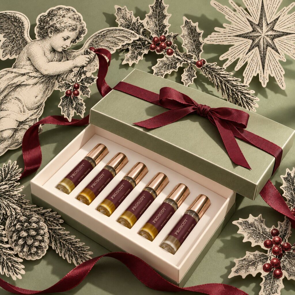 Best Natural Perfume Gifts for Christmas 2026: A Perfumer’s Guide for Her, Him & Home 14 Prosody London Travel Set gift box with burgundy ribbon and six natural eau de parfums, a luxury Christmas perfume gift